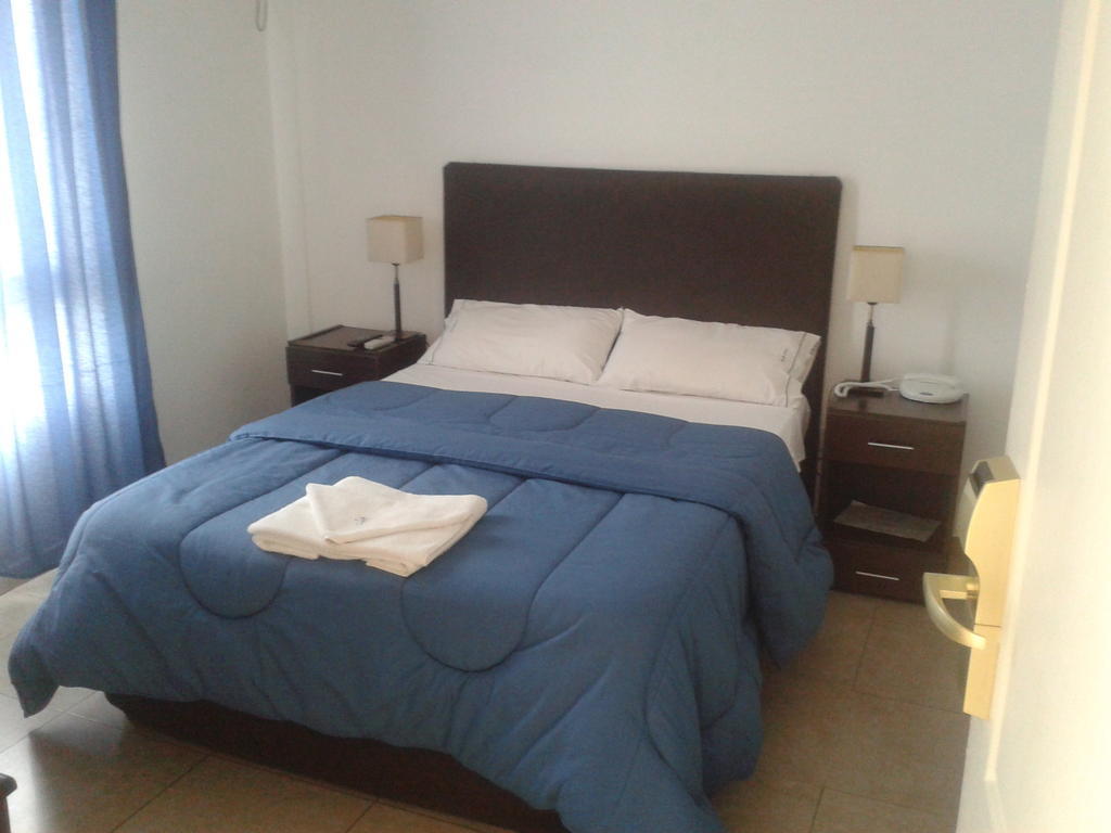 Morada Suites Campana Phòng bức ảnh