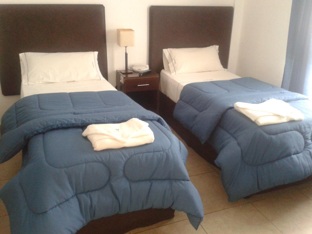 Morada Suites Campana Phòng bức ảnh