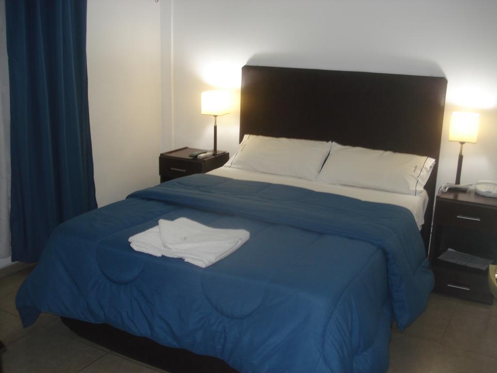 Morada Suites Campana Phòng bức ảnh